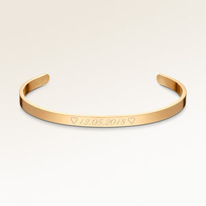 Bangle armband i guld med blank utsida, plats för personlig gravyr